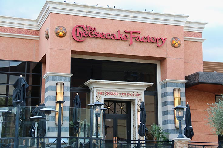 The front of a Cheesecake Factory restaurant.