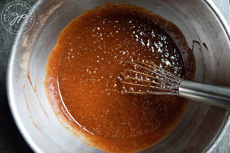 Peanut Butter Swirl Brownie batter whisked together in a mixing bowl.