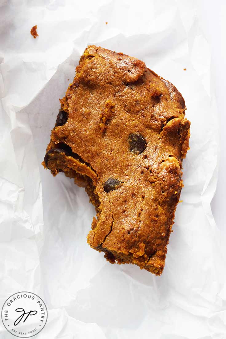 An overhead view of a single Pumpkin Blondie on white parchment.