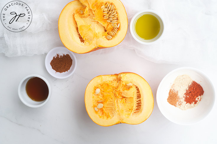 Pumpkin Fries Recipe ingredients in individual bowls on a white surface.