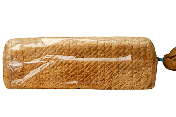 A loaf of packaged wheat bread on a white background.