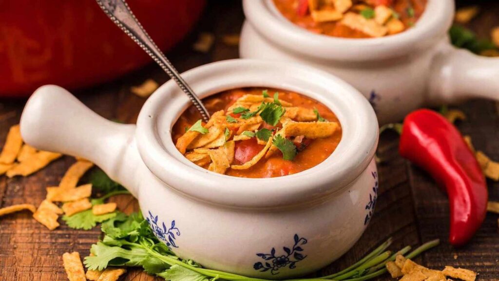 Two crocks full of chicken enchilada soup.