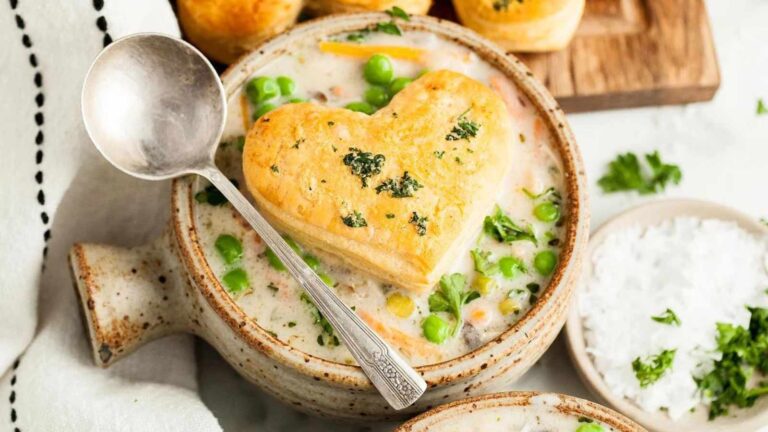 A crock filled with chicken pot pie soup.