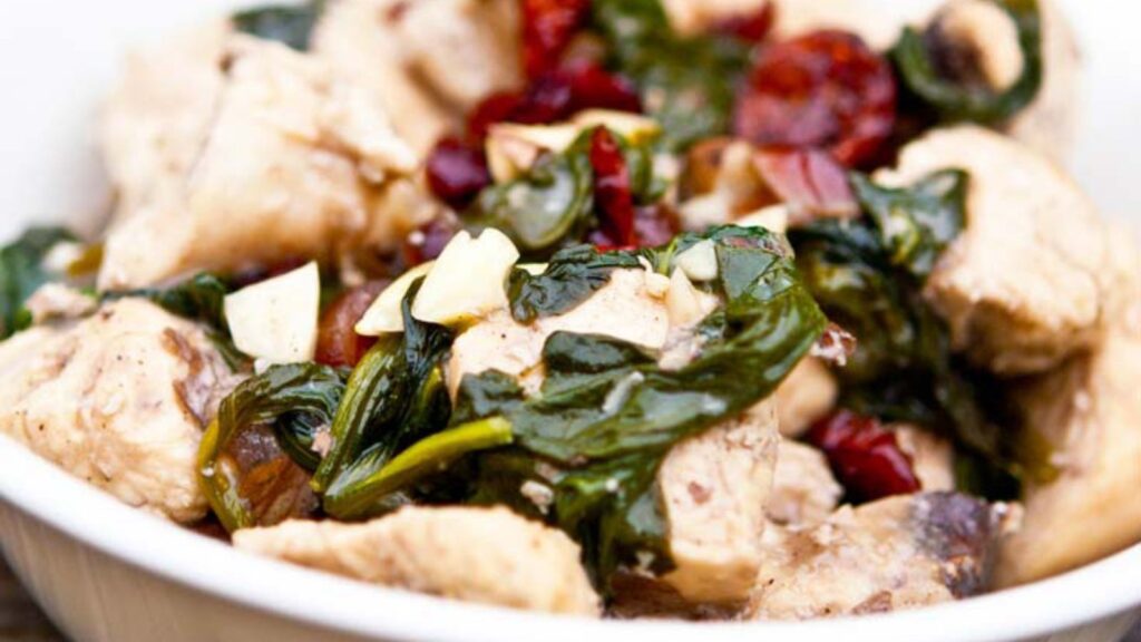 A closeup of a bowl of Cranberry Chicken.