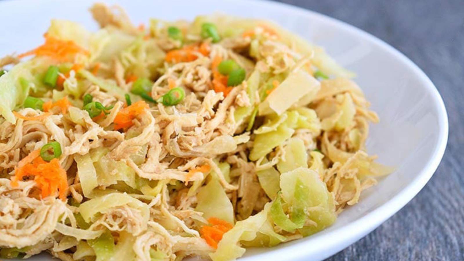 A white bowl filled with Egg Roll In A Bowl.