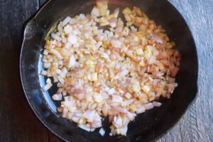 Sautéd onions and garlic in a cast iron skillet.