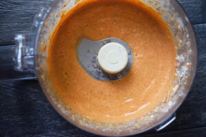 Blended Mediterranean Roasted Red Pepper Dip Recipe ingredients in a food processor bowl.