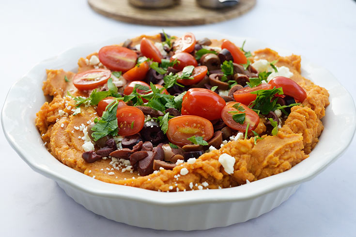 The sweet potato casserole with toppings, waiting for dressing to be added.