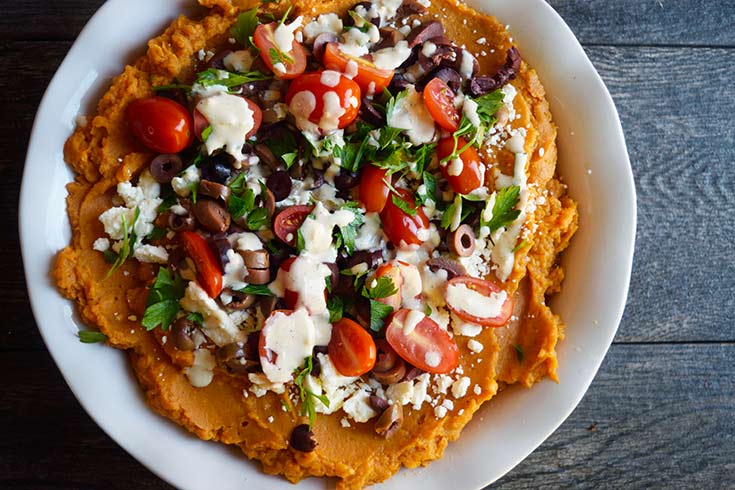 Dressing drizzled over the Mediterranean-Style Sweet Potato Casserole.