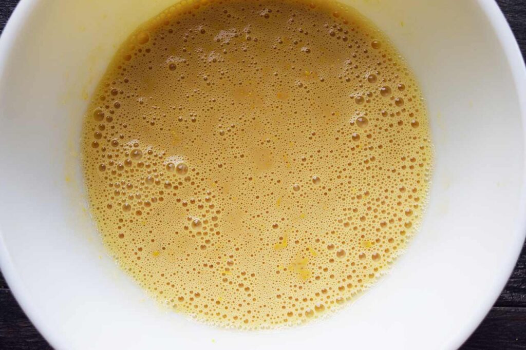 The blended wet ingredients in a mixing bowl.