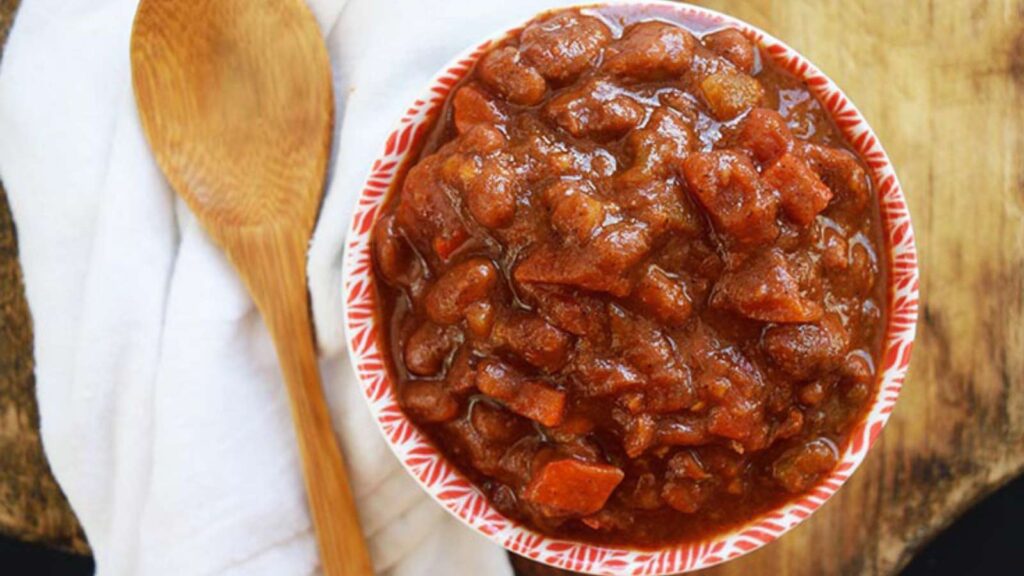 An overhead view of a small bowl filled with Ranch Style Beans.