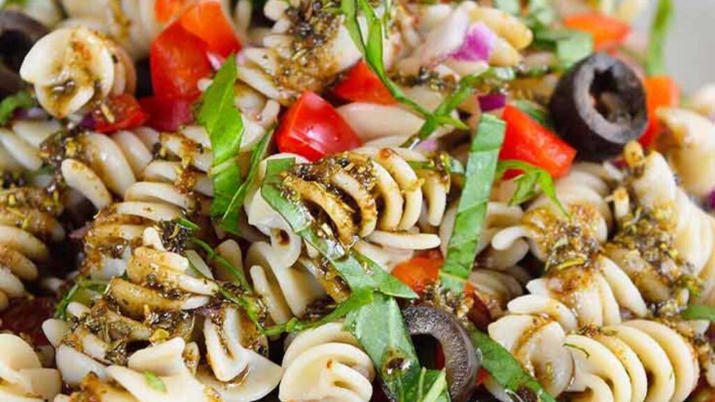 A closeup of Rustic Italian Pasta Salad in a white bowl.