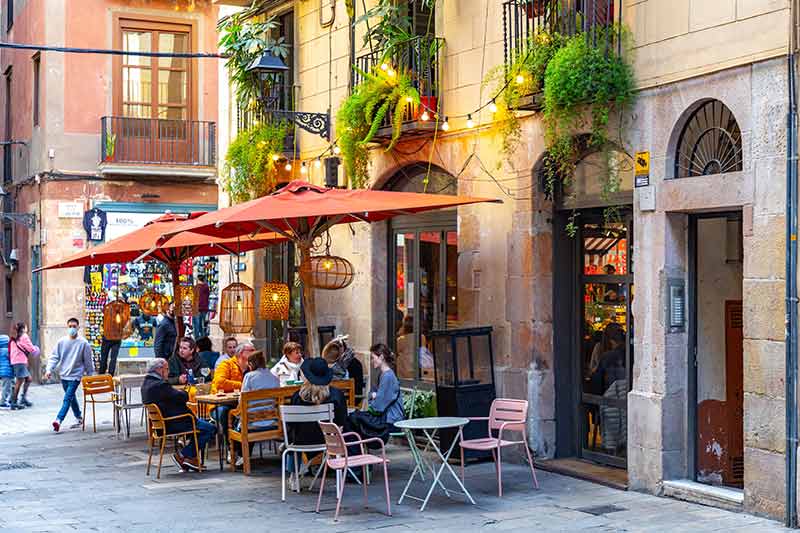 Cafe tables on a Barcelona street.