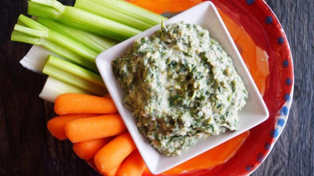 An overhead view of this finished Healthy Spinach Artichoke Dip Recipe.