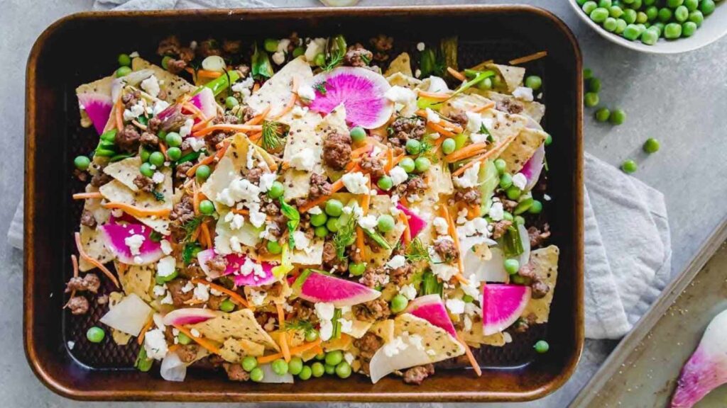 Lamb nachos on a sheet pan.