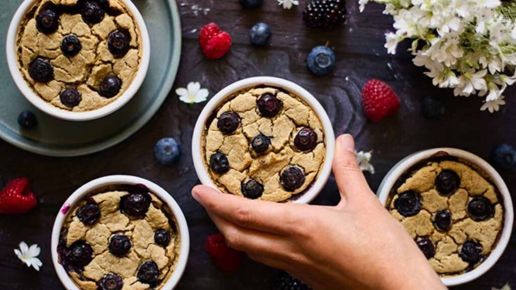 The finished Blended Baked Oatmeal still in white ramekins.