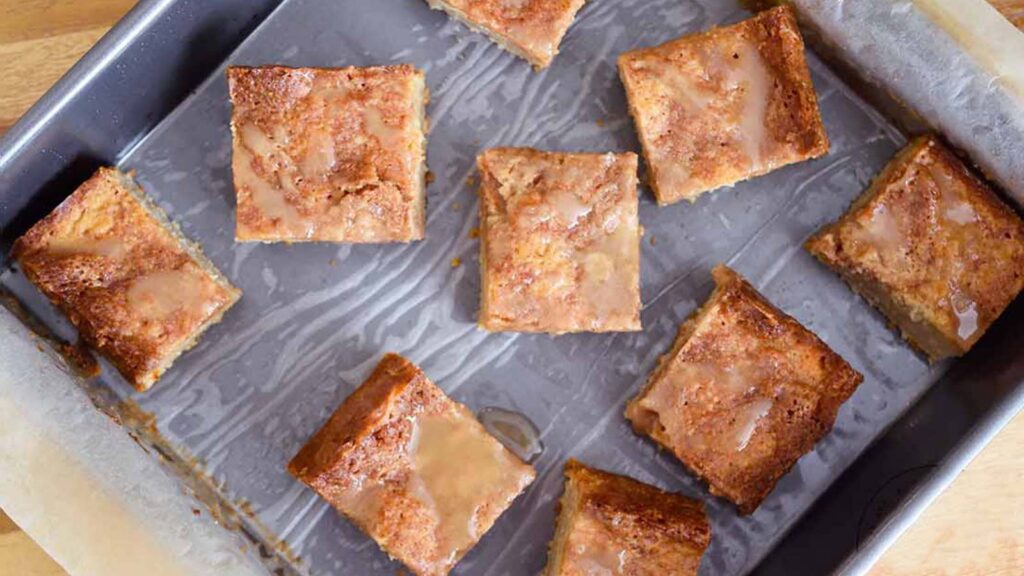 Cut coffee cake in the baking pan.