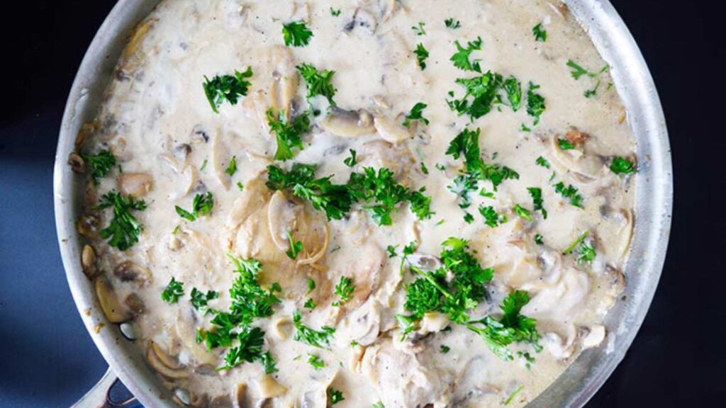 The finished Creamy Garlic Mushroom Chicken Recipe in a skillet.