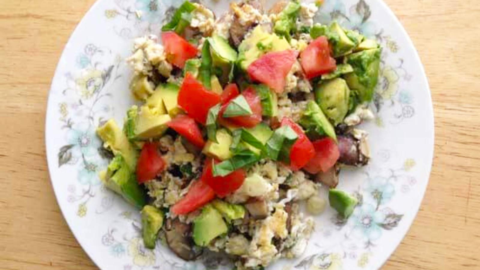 An overhead view of a plate filled with Egg And Vegetable Scramble.