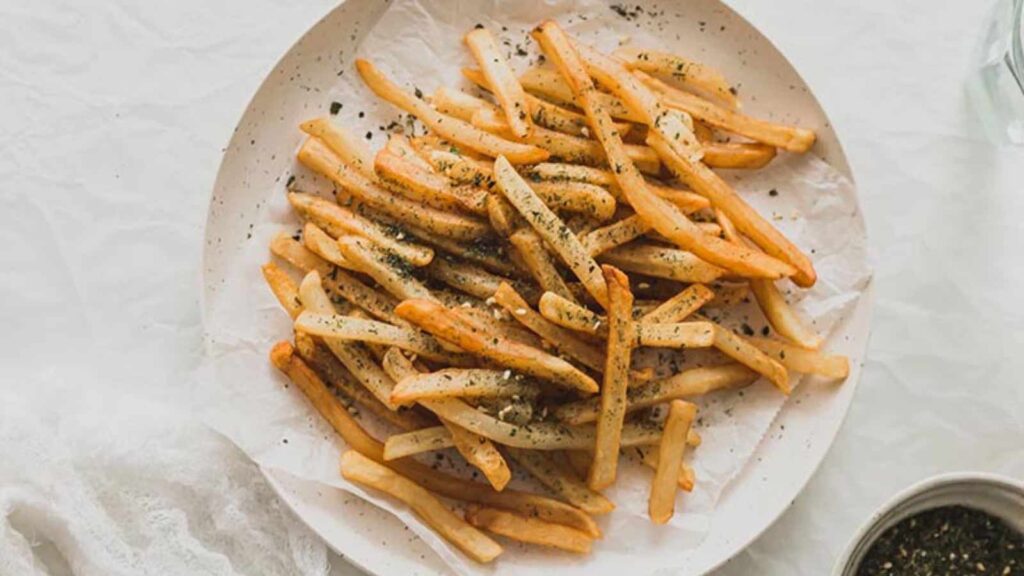 Furikake fries on a white plate.