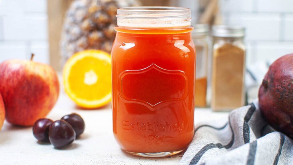 Immunity Booster Shots in a small canning jar sitting on a counter.