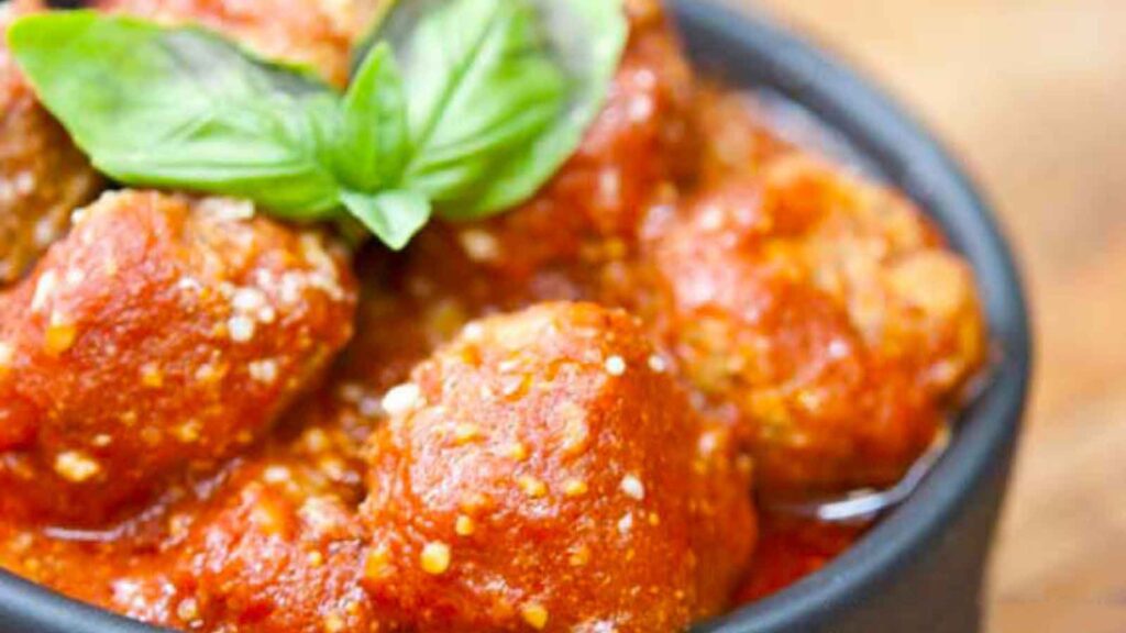 Slow Cooker Italian Style Meatballs in a black bowl.