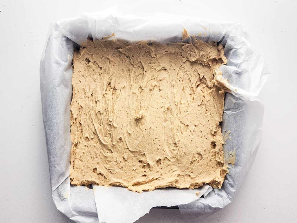 Batter spread evenly in a square baking pan.