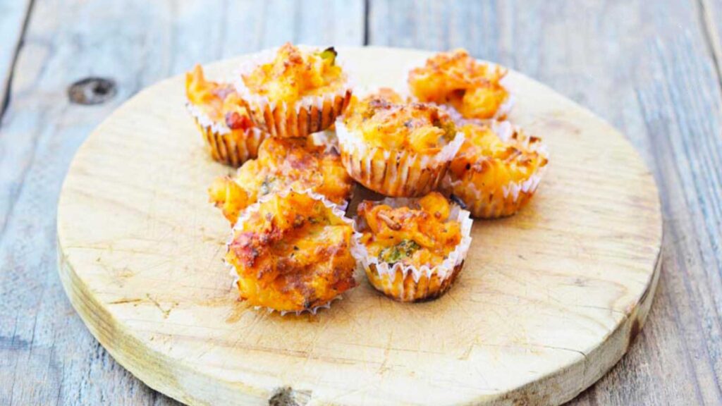 Spaghetti Cups on a round cutting board.