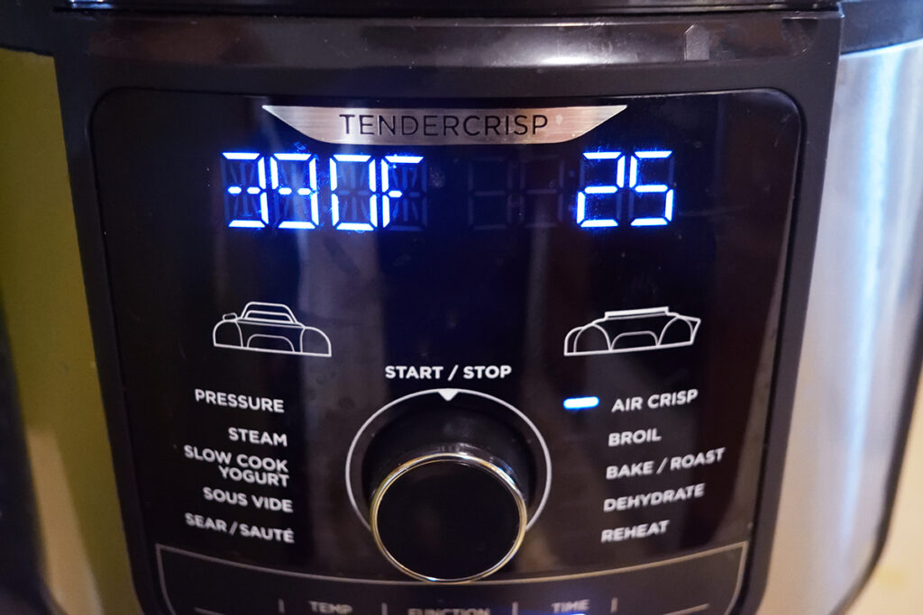 An air fryer set to 390F. and 25 minutes cooking time.