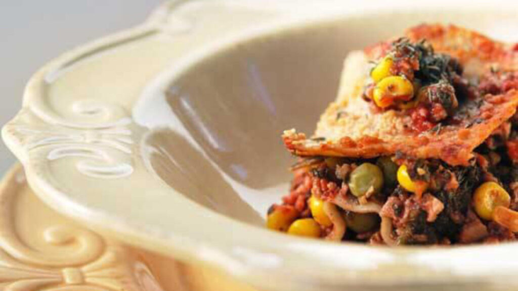 A bowl with a serving of vegan lasagna.