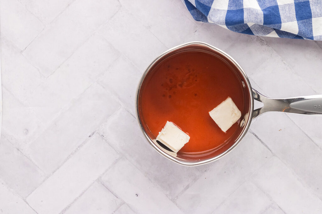 All the wing sauce ingredients in a pot.