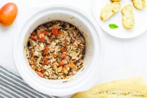 The finished crab mixture still in the slow cooker crock it was cooked in.