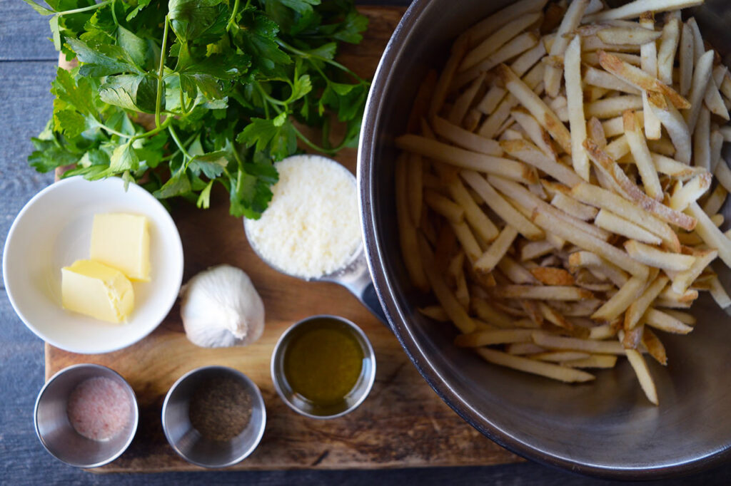 Garlic Fries recipe ingredients in individual containers.