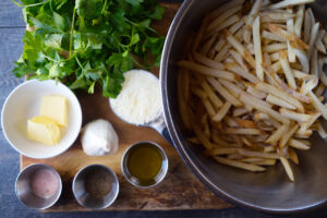 Garlic Fries recipe ingredients in individual containers.