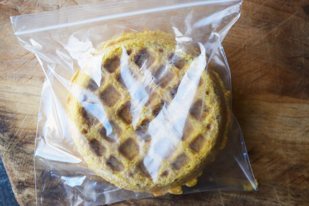 Two Gluten-Free Burger Buns in a zipper-top sandwich bag.