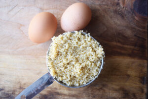 Ingredients for Gluten-Free Burger Buns sitting on a wood surface.