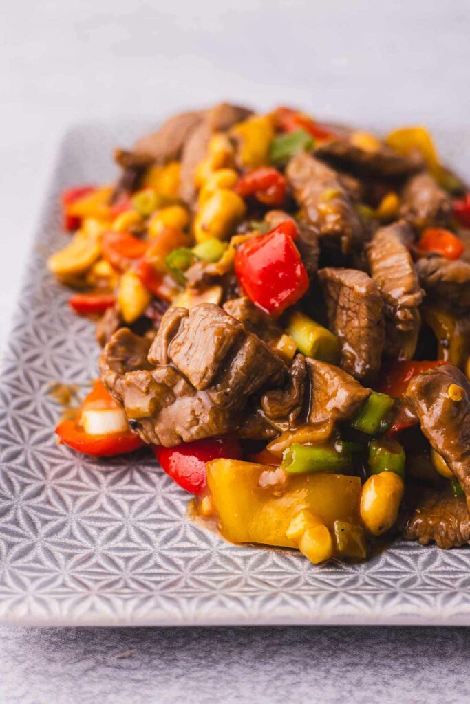 A front view of Kung Pao Beef on a platter.