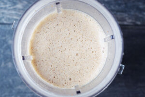 Blended Almond Butter Almond Milk in a blender tumbler.