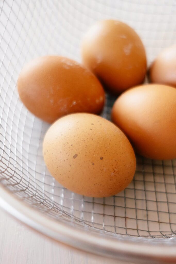 Eggs in a wire basket.