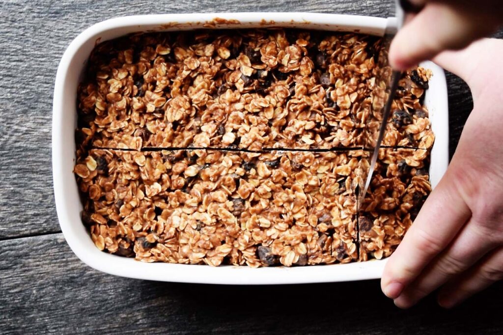 Slicing the granola bars after freezing.