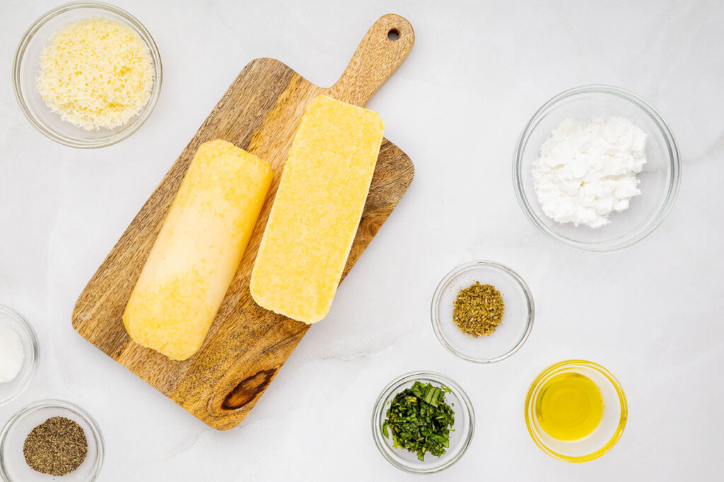 A polenta log cut in half lengthwise.