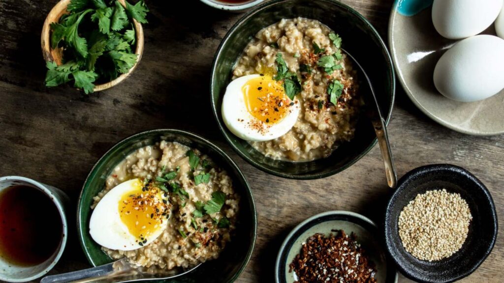 Two bowls of savory oatmeal.