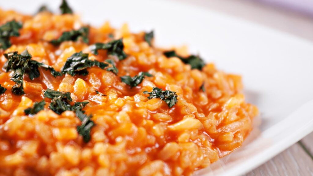 A closeup of spaghetti rice in a white bowl.