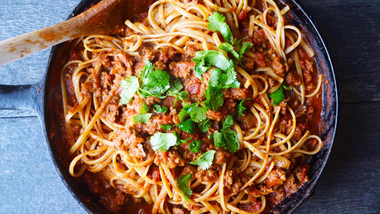 An overhead view of a skillet filled with Taco Spaghetti.