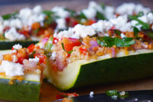 A closeup of a Zucchini Boat that has been cut.