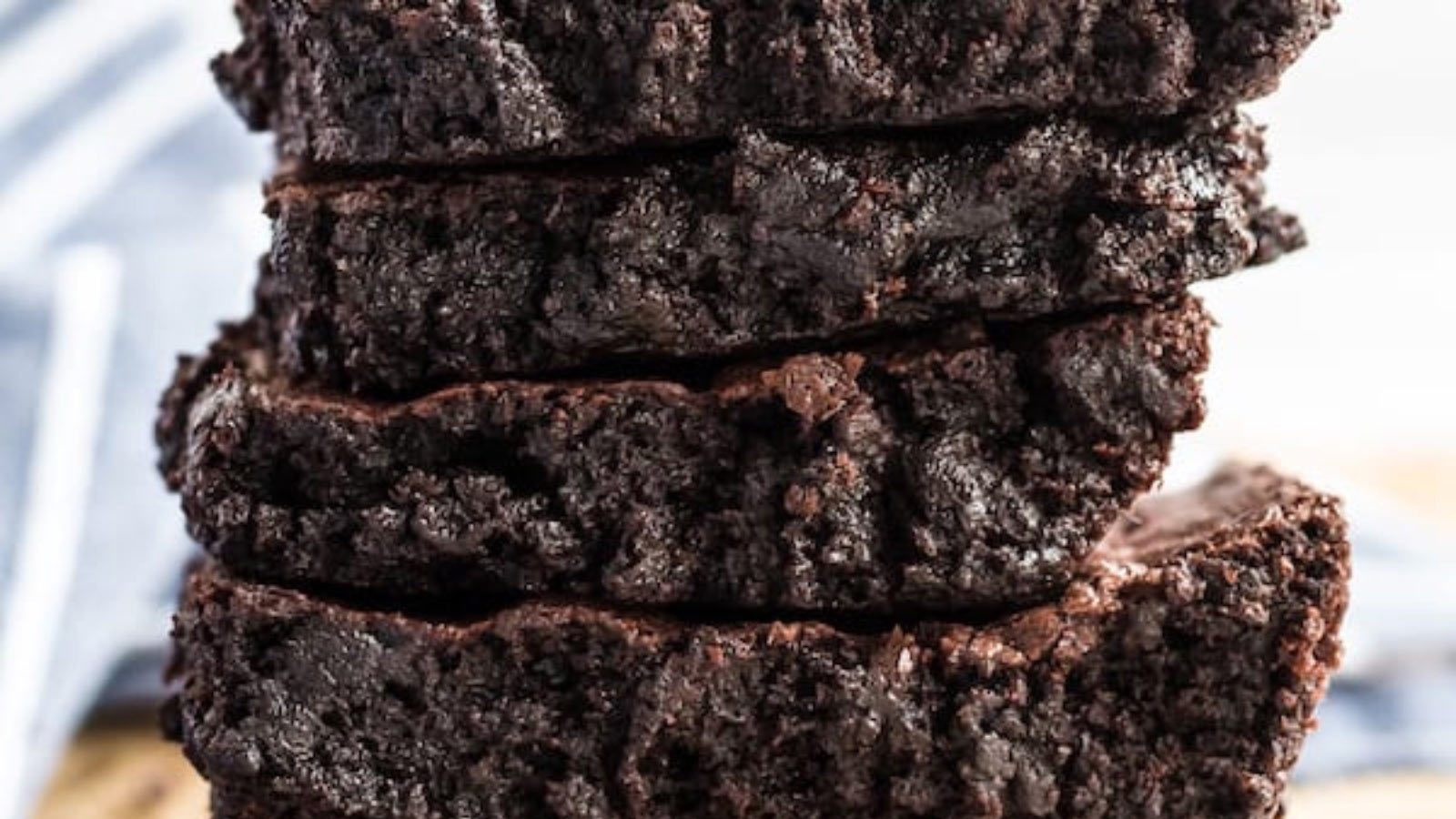A closeup of a stack of brownies.