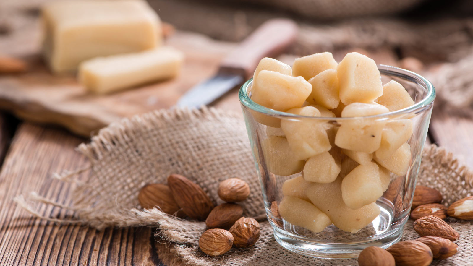Raw Marzipan (close-up shot) on vintage wooden background