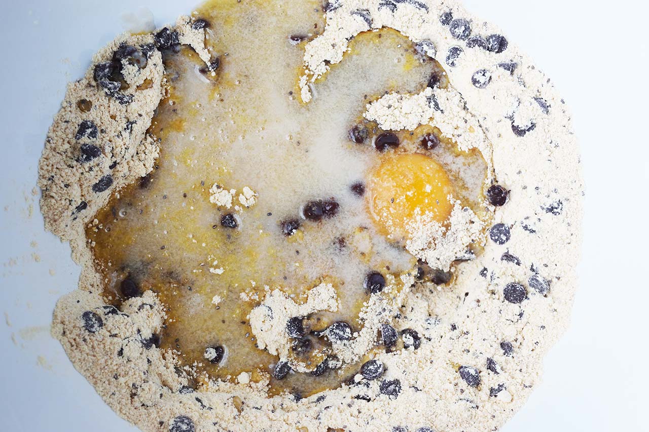 Wet ingredients added to dry ingredients for this Superfood Chocolate Chip Cookies Recipe.