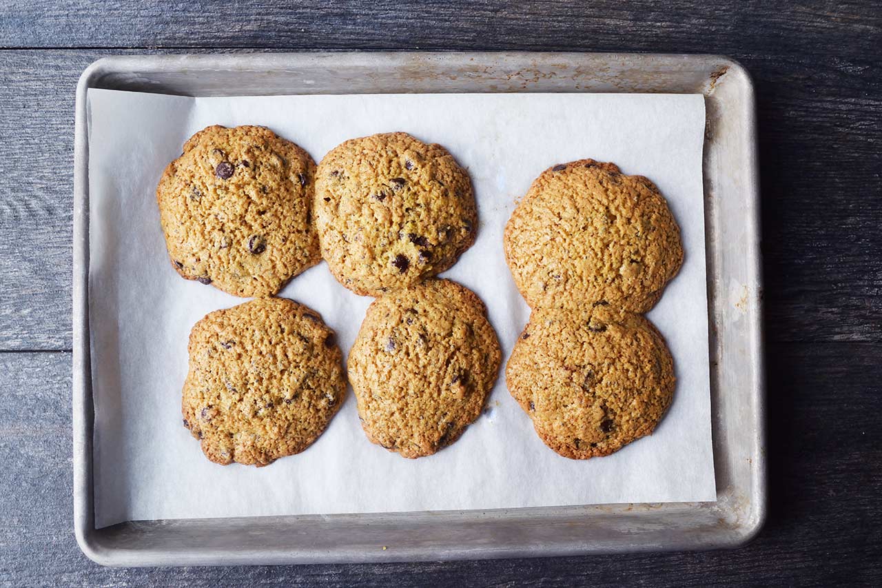 Just baked Superfood Chocolate Chip Cookies on a hot baking pan.