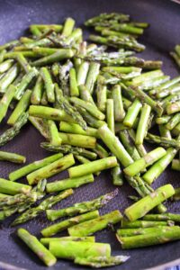 Asparagus browned in a skillet.